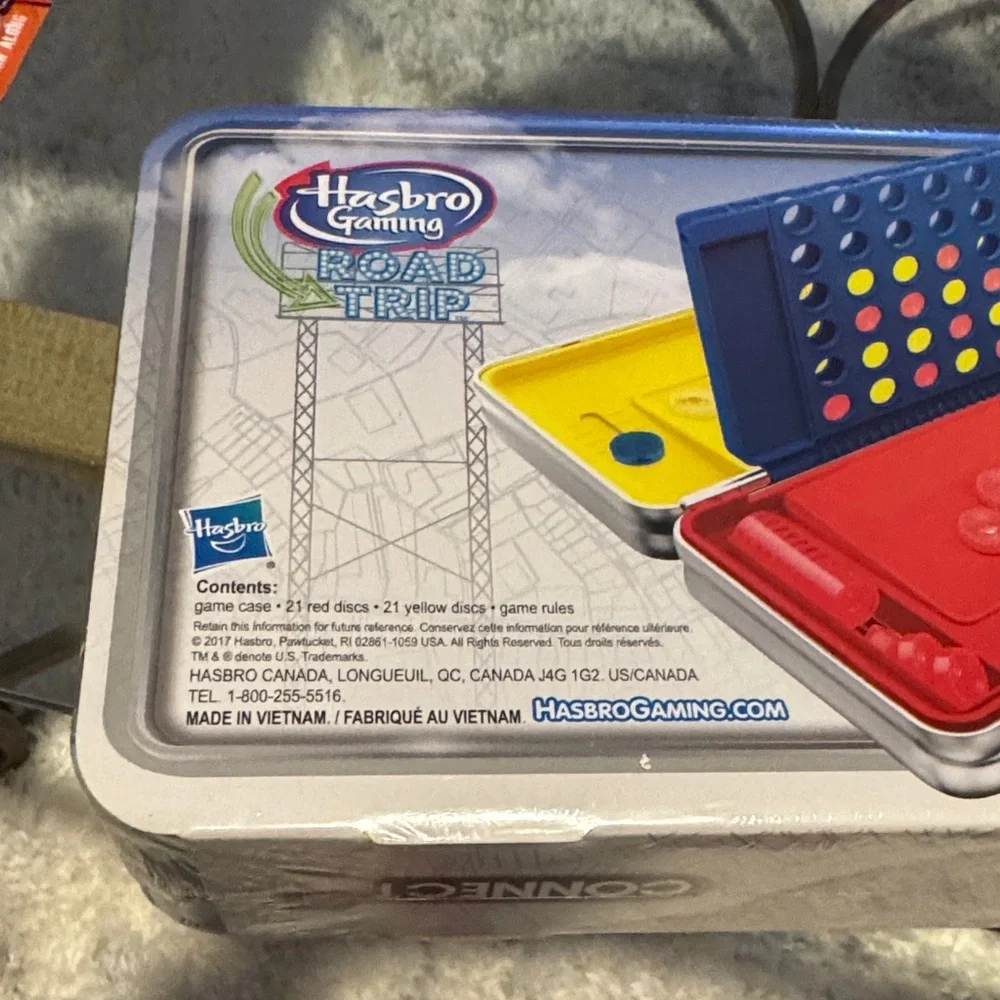 Hasbro Gaming Road Trip Connect 4 Portable Game Tin in Blue and Silver